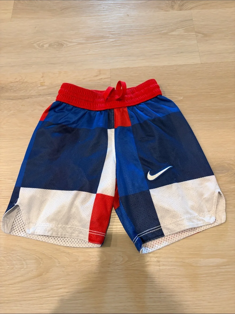 Nike White Mesh Shorts with Red Waistband and Blue Accents